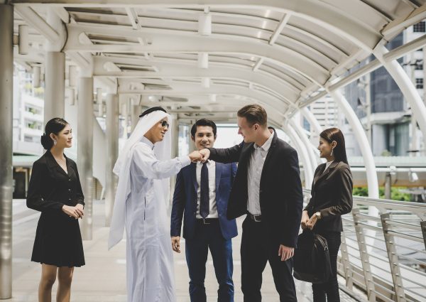 business-partners-team-walking-down-discussing-work business-partners-team-walking-down-discussing-work